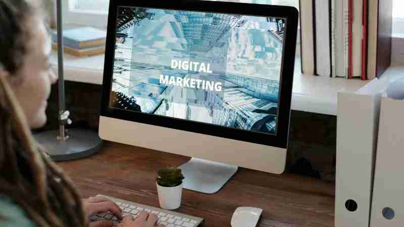 Close-up of a woman working on a digital marketing project in a home office setting., tags: seo nachhaltiges wachstum - pexel
